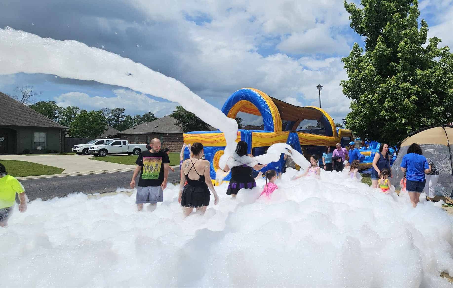 Kids dancing in foam at Louisiana foam party event